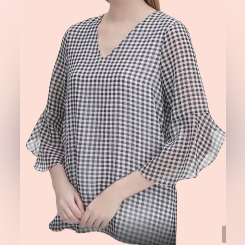 Calvin Klein black and white buffalo, print belle sleeve blouse. Gently used.